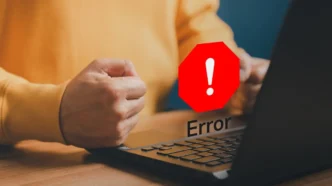 User facing a PC error screen, representing troubleshooting challenges.